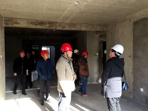 天工公司土建四部神木新村神南华府27、28#楼顺利通过竣工验收