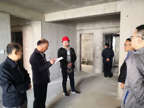 陕煤建设铜煤公司承建的玫瑰园小区多栋楼顺利通过竣工验收