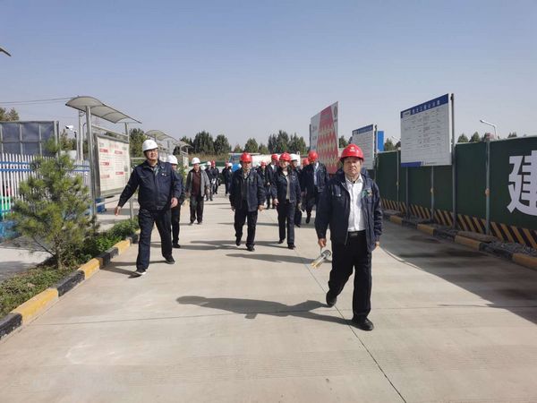 中央储备粮西安直属库有限公司总经理牟敏一行观摩调研陕煤建设天工公司中储粮项目