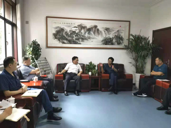 王明智、王宁赴陕钢集团龙钢公司座谈交流