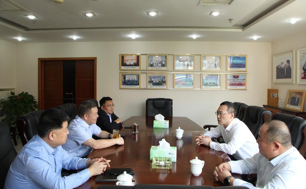 延安旅游集团党委书记、董事长薛恩宇一行到陕煤建设座谈交流